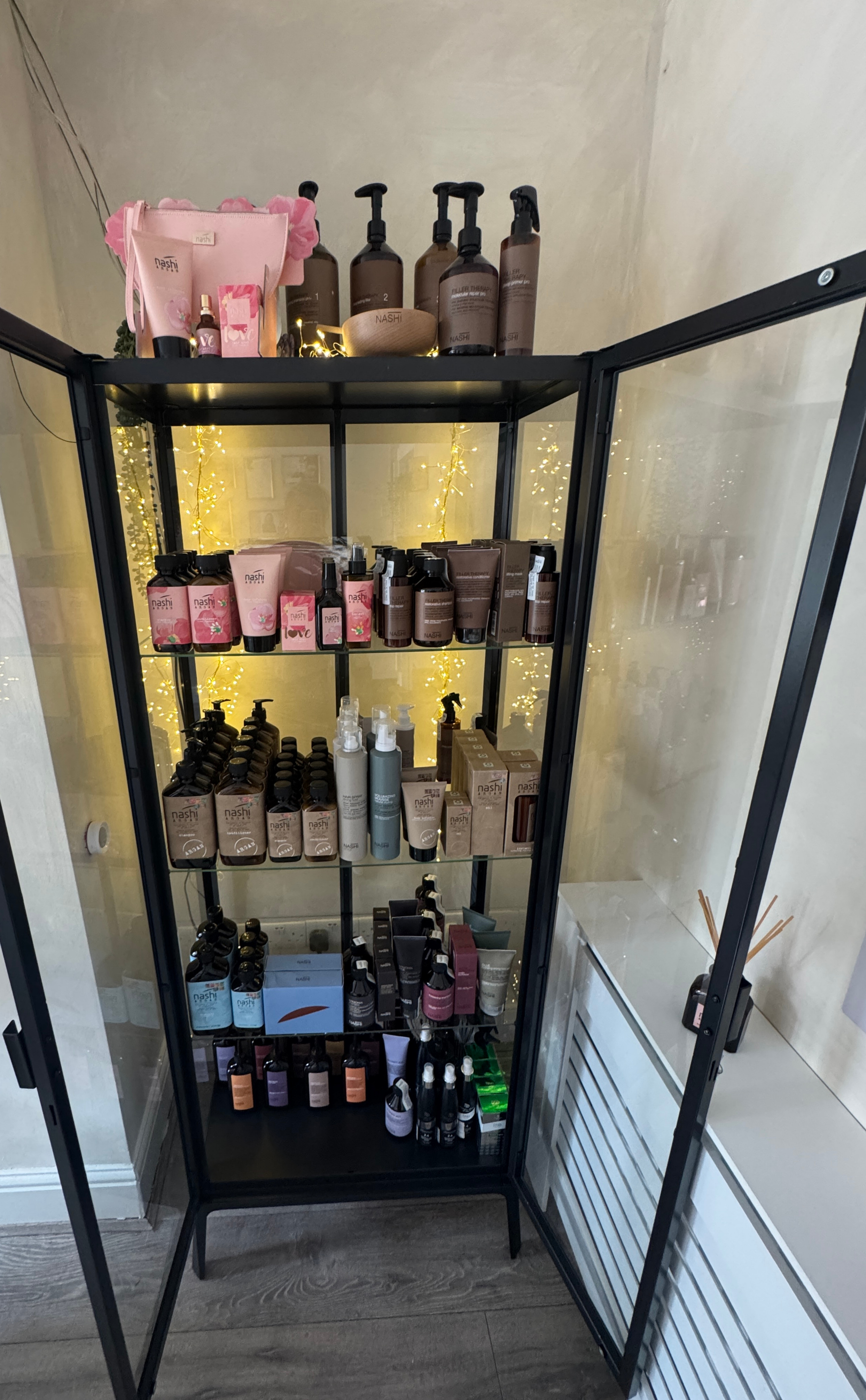 Display shelf with hair products in our salon